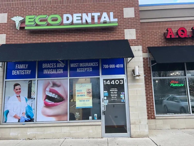 Eco Dental storefront with blue service headers and large patient photos on the windows