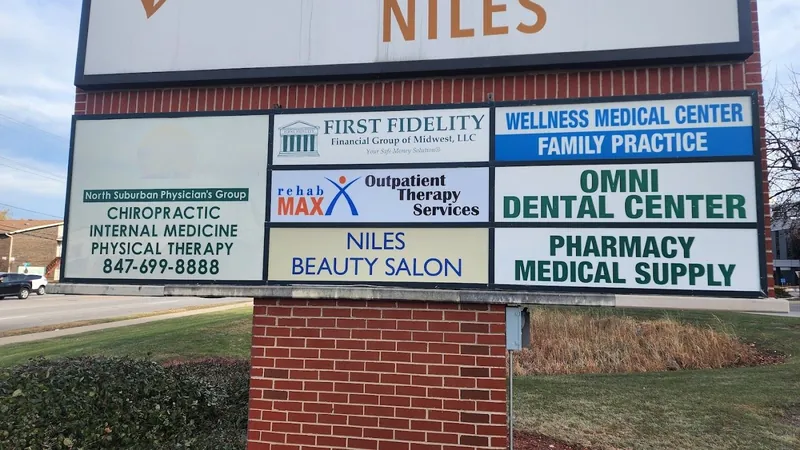 Pylon sign with tenant panels for a chiropractor, a financial group, outpatient therapy, a beauty salon, a dental center and a medical supply store